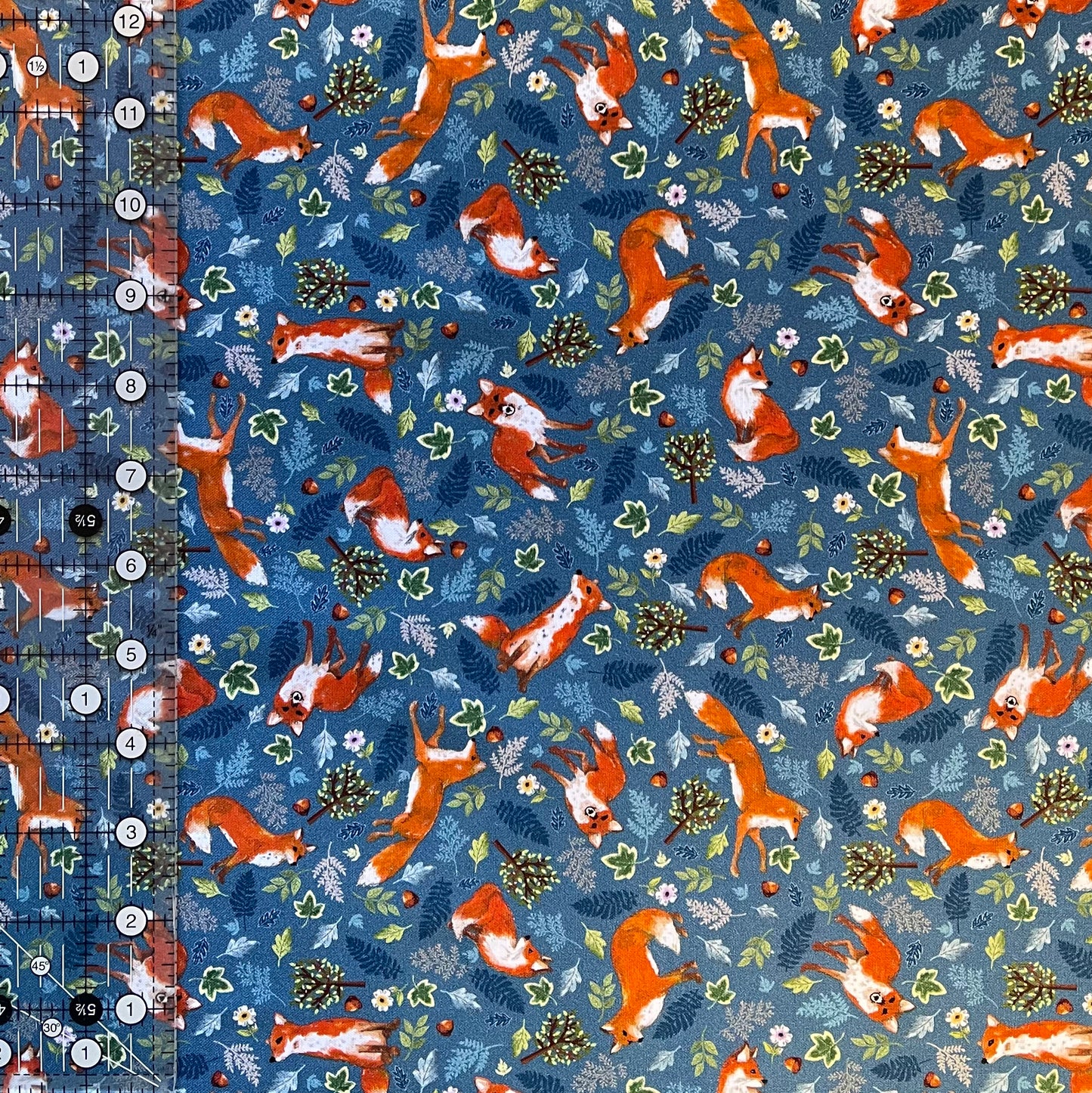 Foxes on blue Fabric