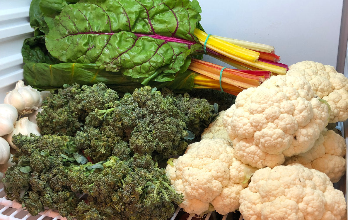 Organic chard, kale and cauliflowers in The Pantry farm shop at Rush Farm