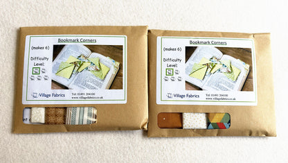 Two Bookmark Corners kits in Neutral, showing how the fabrics vary: creams, browns and a grey stripe in one, mustard, cream and a geometric print in the other