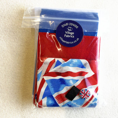 Union Flag Needle Nest kit in its bag: Union Flag fabric, red and blue fabrics, a button and a fastening